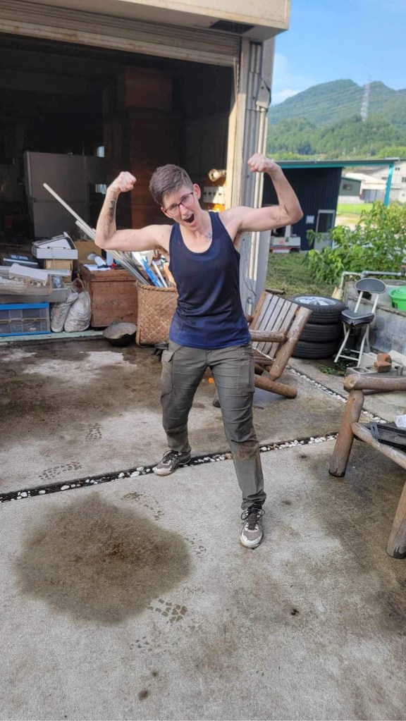 Maren feelin like a strongman after some heavy lifting in the factory