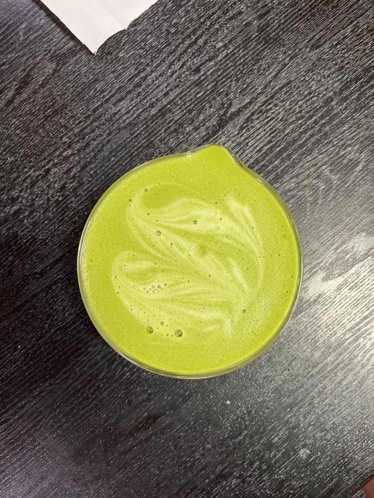 A matcha latte with my reasonable attempt at foam art