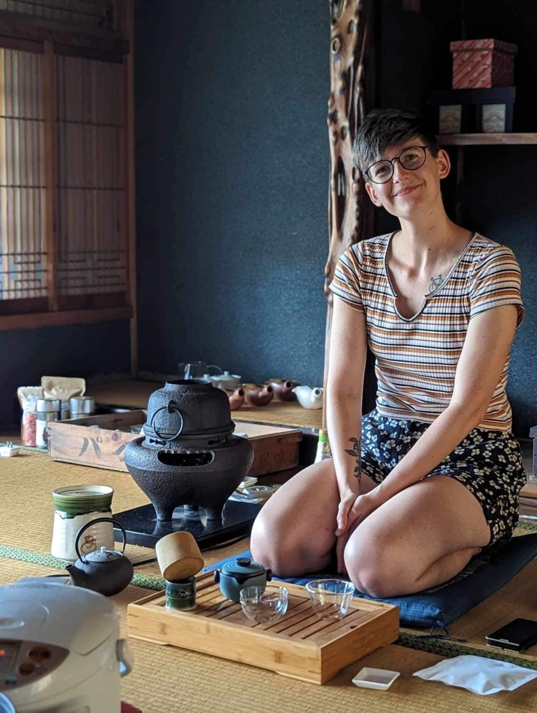 Maren sat down with tea tray, teaware, and chagama smiling happily